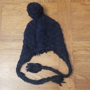 Black toque with pompom